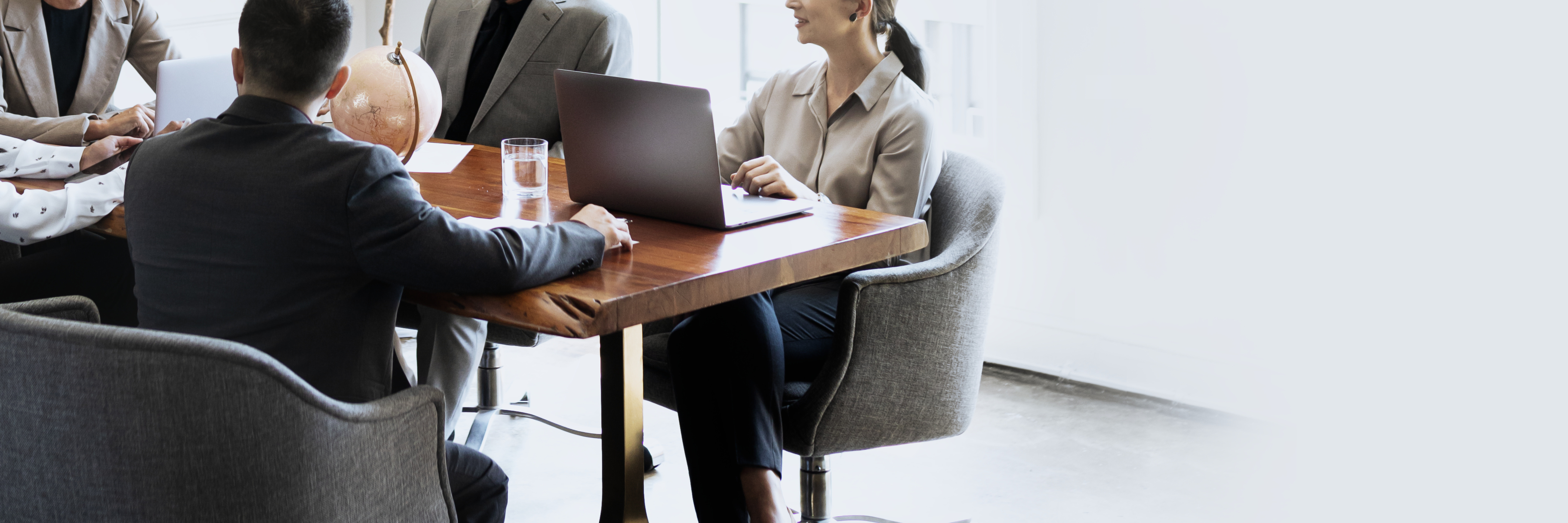 Investors meeting around a conference table